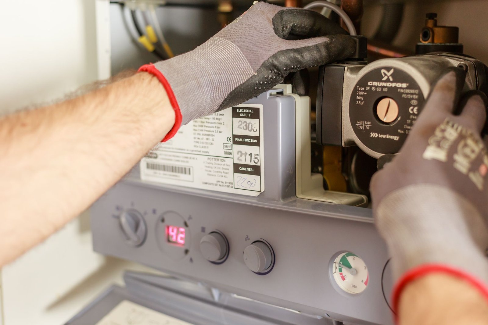 Technician servicing a residential water heater